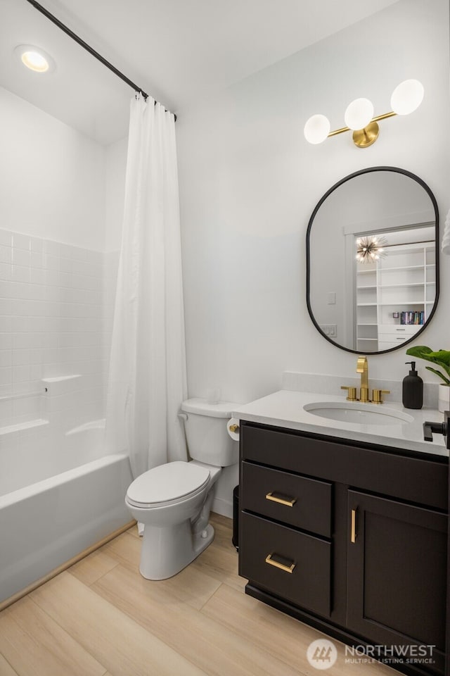 14646 35th Ct NE, Lake Forest Park, WA 98155 - full bath with vanity, shower / bathtub combination with curtain, and wood finished floors