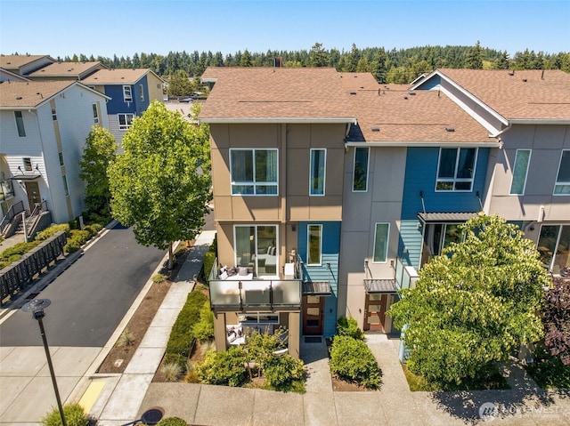 14646 35th Ct NE, Lake Forest Park, WA 98155 - view of front of home featuring a residential view, a shingled roof, and stucco siding
