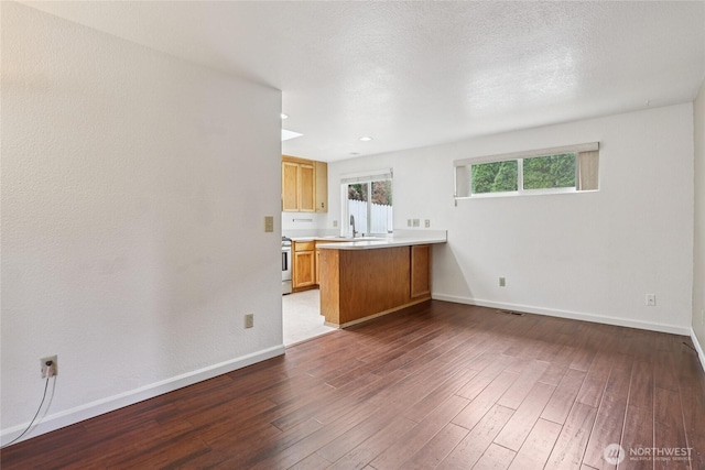 13940 113th Ave NE, Kirkland, WA 98034 - unfurnished living room featuring wood finished floors and recessed lighting