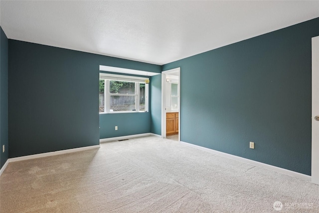 13940 113th Ave NE, Kirkland, WA 98034 - carpeted spare room featuring baseboards