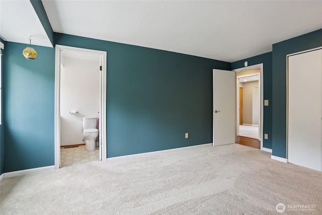 13940 113th Ave NE, Kirkland, WA 98034 - unfurnished bedroom featuring carpet flooring and connected bathroom