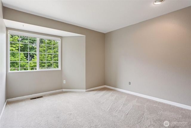 13940 113th Ave NE, Kirkland, WA 98034 - unfurnished room with baseboards and light carpet
