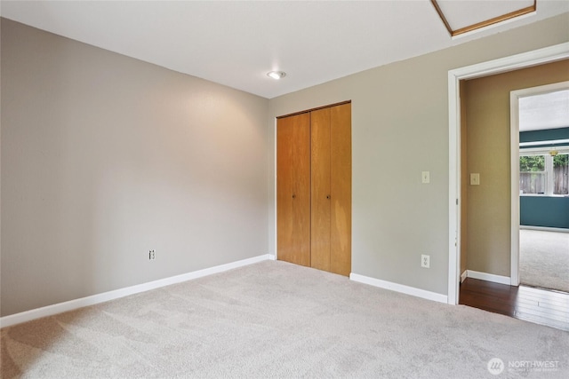 13940 113th Ave NE, Kirkland, WA 98034 - unfurnished bedroom with carpet, a closet, and attic access