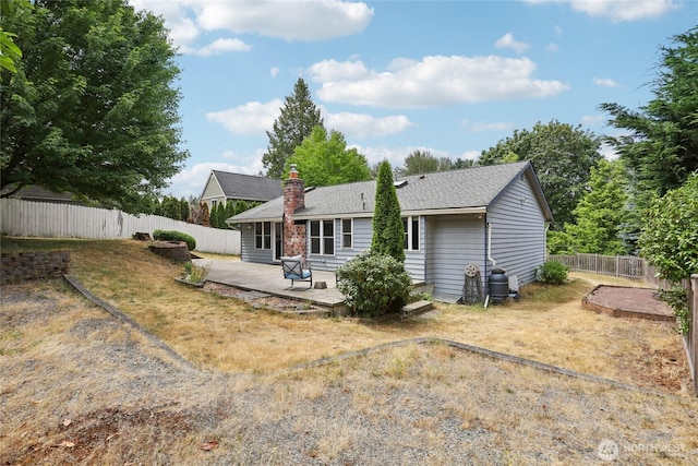 13940 113th Ave NE, Kirkland, WA 98034 - rear view of property featuring a patio area, a fenced backyard, and a chimney