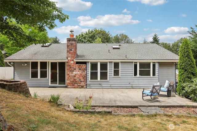 13940 113th Ave NE, Kirkland, WA 98034 - rear view of property featuring a patio area, a chimney, a yard, and roof with shingles