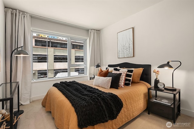 583 Battery St Unit 212N, Seattle, WA 98121 - bedroom with light colored carpet and baseboards