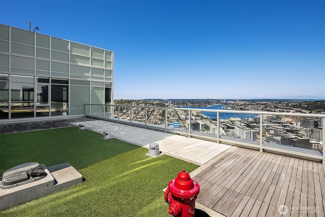 583 Battery St Unit 212N, Seattle, WA 98121 - view of yard featuring a water view and a balcony