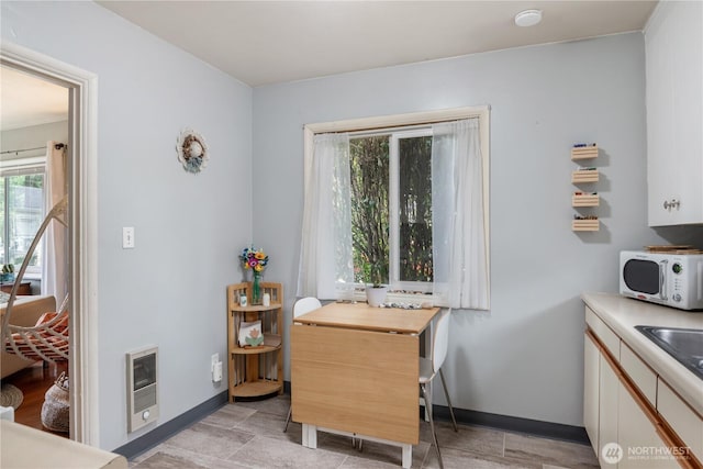 11341136 16th Ave, Longview, WA 98632 - dining space featuring heating unit and baseboards