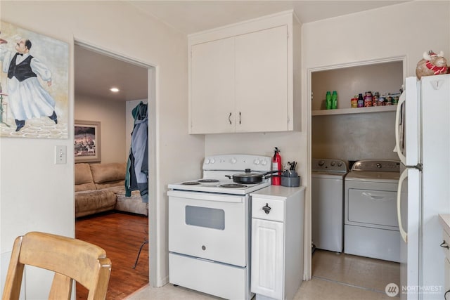 11341136 16th Ave, Longview, WA 98632 - kitchen featuring white appliances, white cabinets, light countertops, and separate washer and dryer