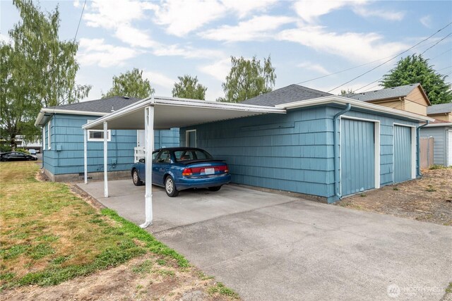 11341136 16th Ave, Longview, WA 98632 - view of front of property featuring an attached carport, roof with shingles, and driveway