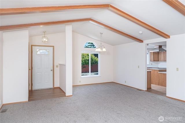 2289 Towne Point Ave, Port Townsend, WA 98368 - unfurnished living room with a chandelier and carpet