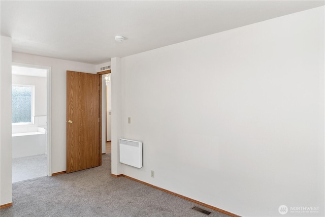 2289 Towne Point Ave, Port Townsend, WA 98368 - unfurnished room featuring carpet floors and heating unit