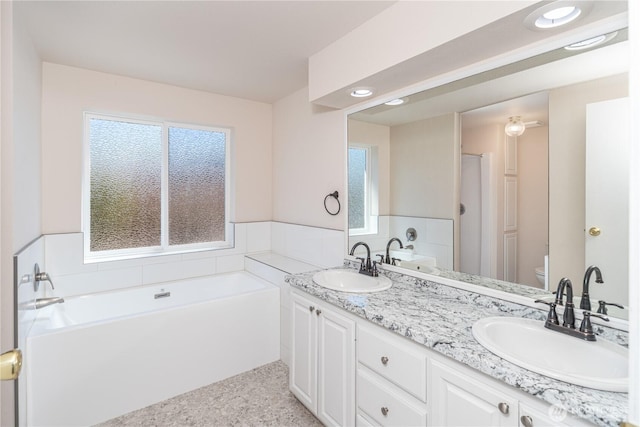 2289 Towne Point Ave, Port Townsend, WA 98368 - full bathroom featuring a garden tub and double vanity