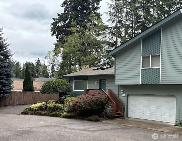 933 Fern St SW, Olympia, WA 98502 - view of front of property with an attached garage and driveway