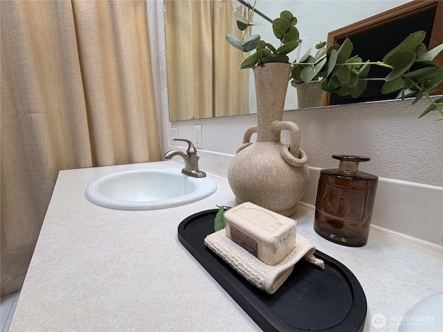 933 Fern St SW, Olympia, WA 98502 - bathroom view of vanity and baseboards