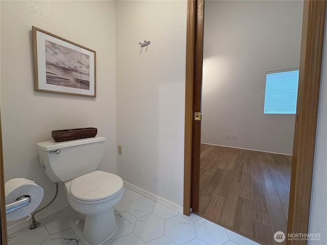 933 Fern St SW, Olympia, WA 98502 - bathroom with toilet and baseboards