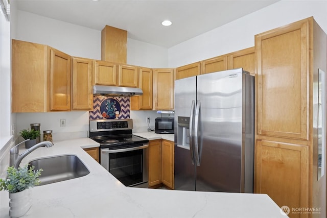 352 227th Ln NE Unit 142, Sammamish, WA 98074 - kitchen featuring appliances with stainless steel finishes, light countertops, under cabinet range hood, and recessed lighting