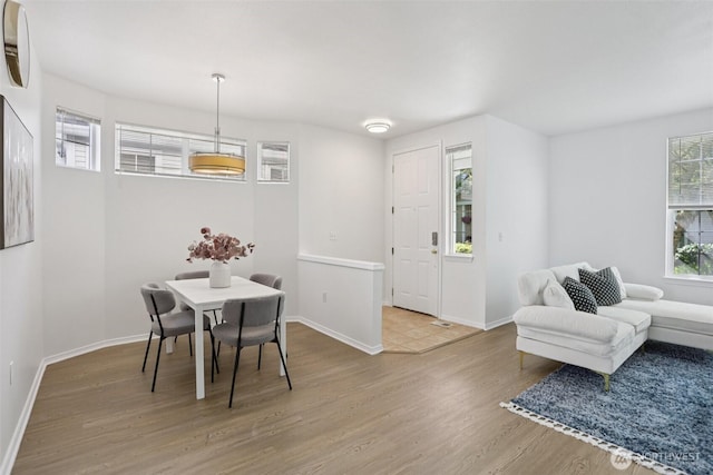 352 227th Ln NE Unit 142, Sammamish, WA 98074 - dining area with wood finished floors and baseboards