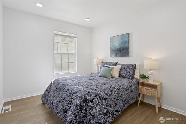 352 227th Ln NE Unit 142, Sammamish, WA 98074 - bedroom featuring wood finished floors and recessed lighting