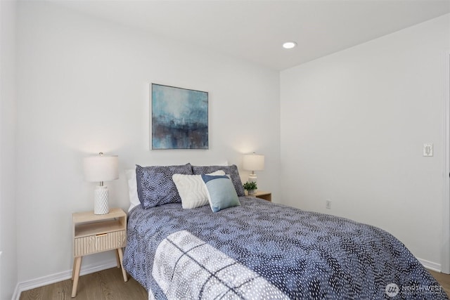 352 227th Ln NE Unit 142, Sammamish, WA 98074 - bedroom featuring wood finished floors and recessed lighting