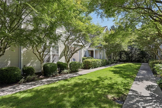 352 227th Ln NE Unit 142, Sammamish, WA 98074 - view of property exterior featuring a yard