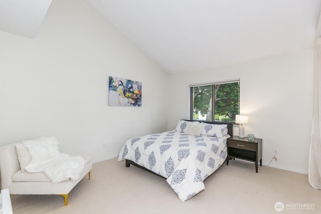6367 Sand Point Way NE, Seattle, WA 98115 - carpeted bedroom featuring lofted ceiling and baseboards