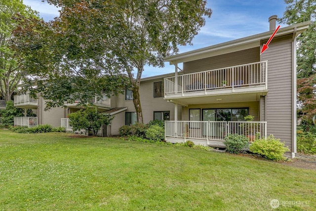 6367 Sand Point Way NE, Seattle, WA 98115 - back of house featuring a balcony and a yard