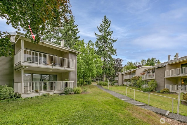6367 Sand Point Way NE, Seattle, WA 98115 - view of green lawn with a balcony