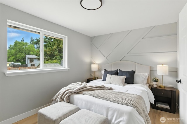 21905 128th St E, Bonney Lake, WA 98391 - bedroom featuring wood finished floors and baseboards