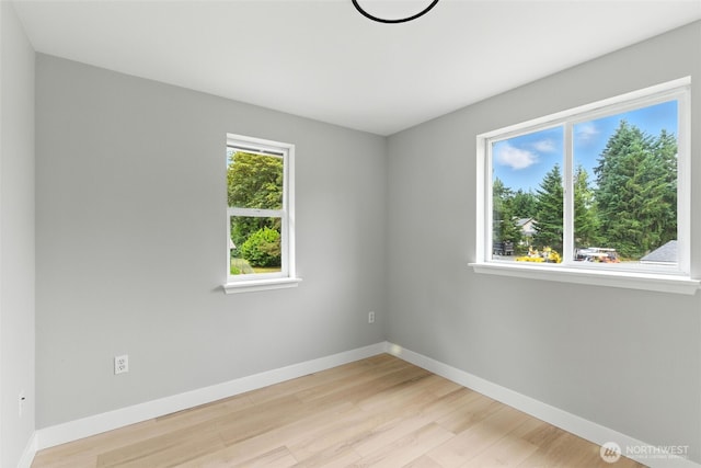 21905 128th St E, Bonney Lake, WA 98391 - spare room featuring light wood-style flooring