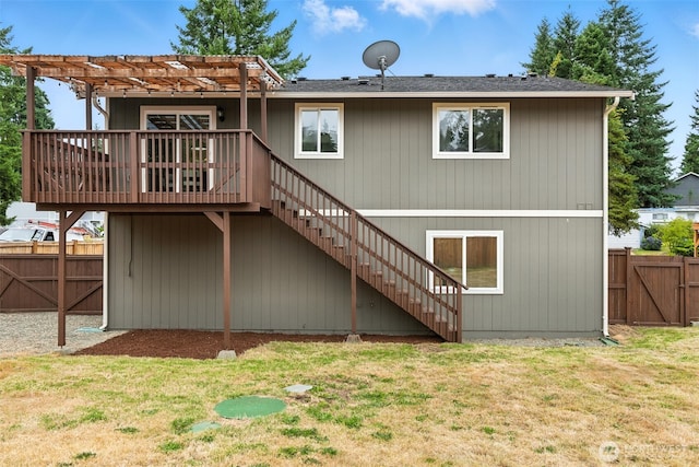 21905 128th St E, Bonney Lake, WA 98391 - back of property featuring stairway, a deck, a pergola, and a gate