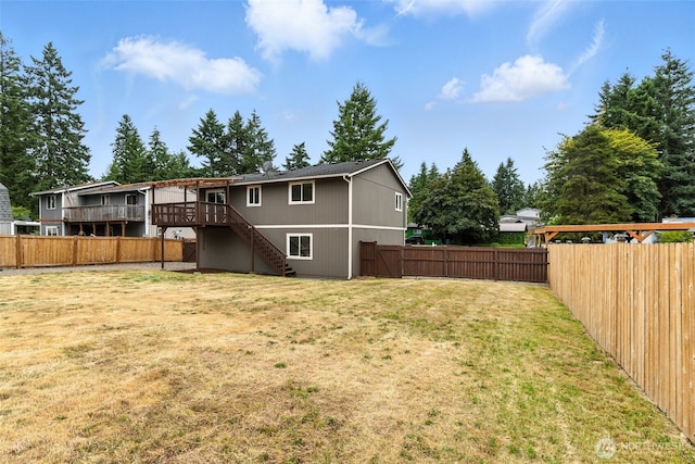 21905 128th St E, Bonney Lake, WA 98391 - rear view of property featuring stairs, a fenced backyard, and a wooden deck