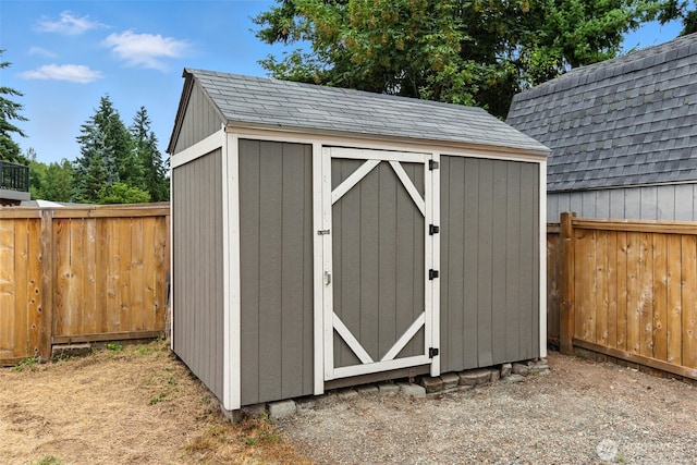 21905 128th St E, Bonney Lake, WA 98391 - view of shed with a fenced backyard