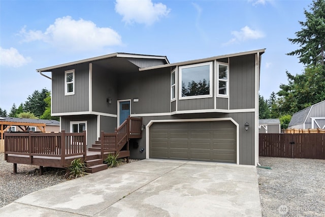 21905 128th St E, Bonney Lake, WA 98391 - split foyer home featuring an attached garage and concrete driveway