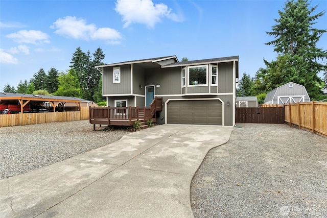 21905 128th St E, Bonney Lake, WA 98391 - bi-level home featuring a garage, driveway, and a gate