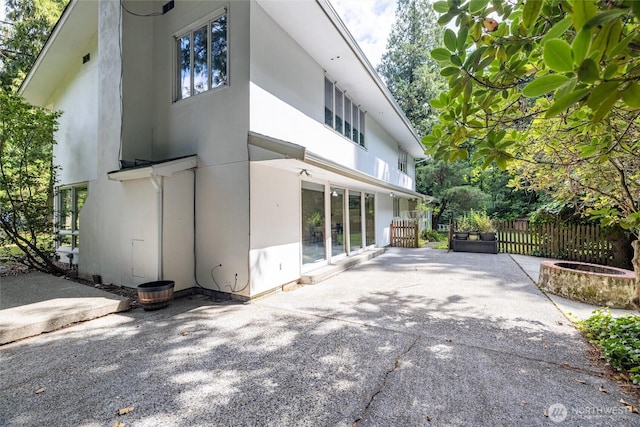 3928 Sorenson Rd, Everson, WA 98247 - view of side of property featuring a patio area and stucco siding