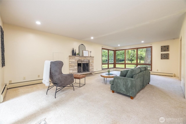 3928 Sorenson Rd, Everson, WA 98247 - carpeted living area featuring a baseboard radiator, a stone fireplace, and recessed lighting