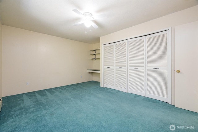 3928 Sorenson Rd, Everson, WA 98247 - unfurnished bedroom with carpet floors, a closet, and a ceiling fan