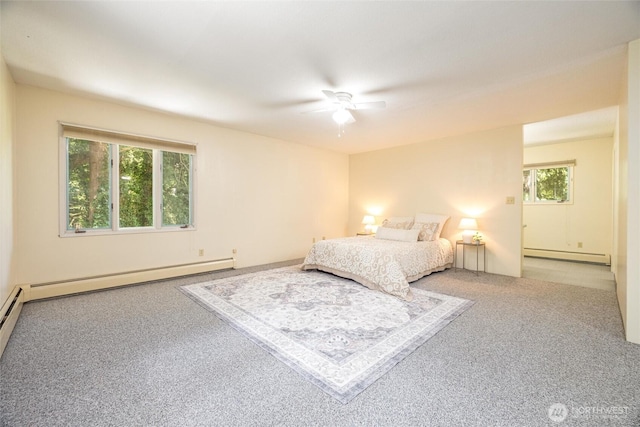 3928 Sorenson Rd, Everson, WA 98247 - bedroom featuring baseboard heating, carpet, a baseboard radiator, and ceiling fan
