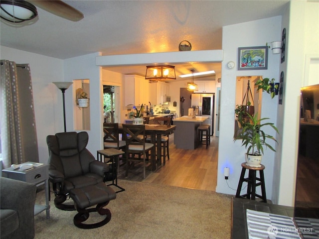 4917 107th Ave SE, Snohomish, WA 98290 - living room with a ceiling fan and light wood-style flooring