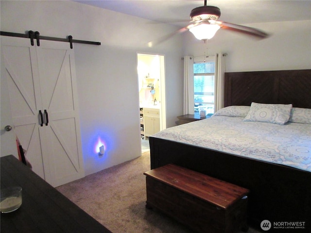 4917 107th Ave SE, Snohomish, WA 98290 - carpeted bedroom featuring a barn door, a ceiling fan, and ensuite bath