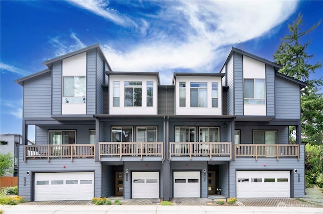 6855 NE 170th St Unit 102, Kenmore, WA 98028 - contemporary house with a garage and driveway