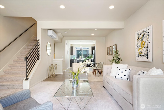 6855 NE 170th St Unit 102, Kenmore, WA 98028 - living area featuring stairway, a wall mounted AC, recessed lighting, and light colored carpet