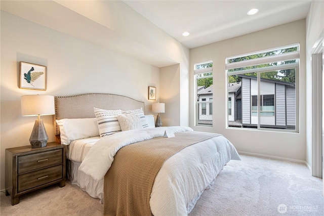6855 NE 170th St Unit 102, Kenmore, WA 98028 - bedroom with light colored carpet and recessed lighting