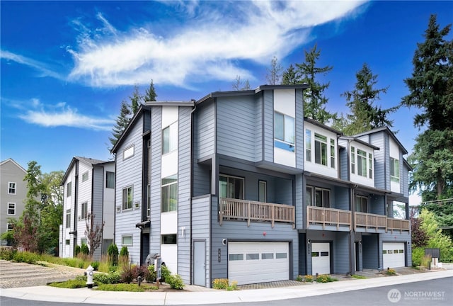 6855 NE 170th St Unit 102, Kenmore, WA 98028 - view of front facade featuring an attached garage
