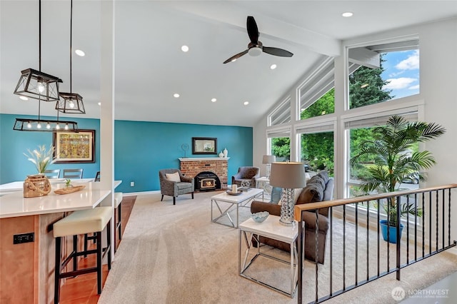 13506 89th Pl NE, Kirkland, WA 98034 - living area with a ceiling fan, beamed ceiling, a brick fireplace, high vaulted ceiling, and recessed lighting