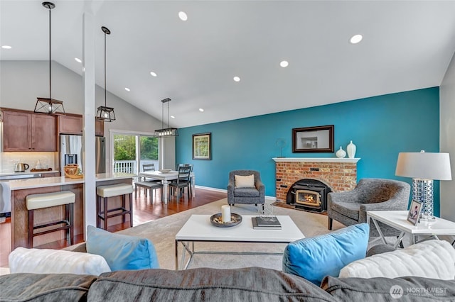 13506 89th Pl NE, Kirkland, WA 98034 - living area featuring recessed lighting, high vaulted ceiling, and wood finished floors