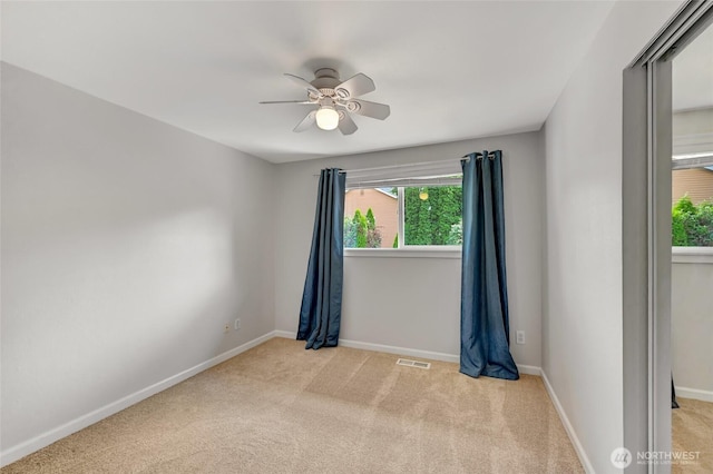 13506 89th Pl NE, Kirkland, WA 98034 - spare room featuring ceiling fan and light carpet