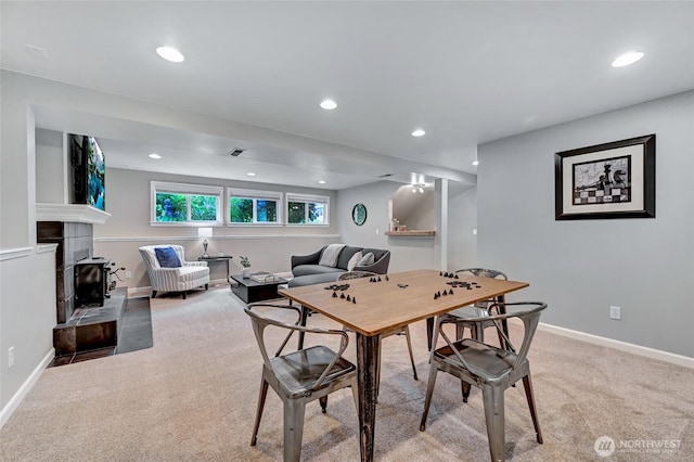 13506 89th Pl NE, Kirkland, WA 98034 - dining room featuring light carpet, recessed lighting, and a tile fireplace
