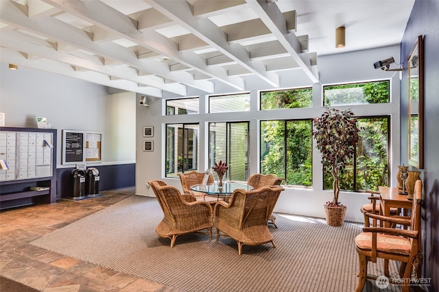 211 E Summit Ave Unit S117, Seattle, WA 98102 - dining area with beam ceiling, a towering ceiling, and mail area